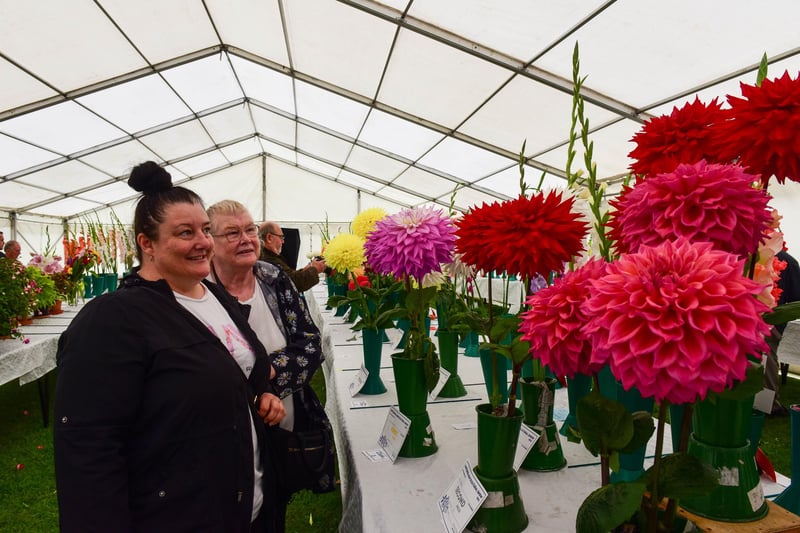 Andrea and Vivienne Hogan admire some of the blooms at the show.