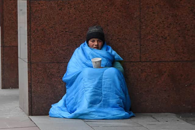 A recent survey by the homeless charity, Crisis, found that one in two current or recent rough sleepers had been intimidated or threatened with violence, and one in three had had things thrown at them. (Photo by ANDY BUCHANAN/AFP via Getty Images)