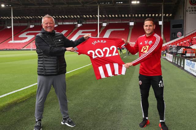 Ahead of the Premier League restart, the Blades have been boosted by captain Billy Sharp signing a new contract. Sharp is picture with manager Chris Wilder after agreeing a two year deal. They are pictured at Bramall Lane, Sheffield. Picture date: 10th June 2020. Picture credit should read: Simon Bellis/Sportimage