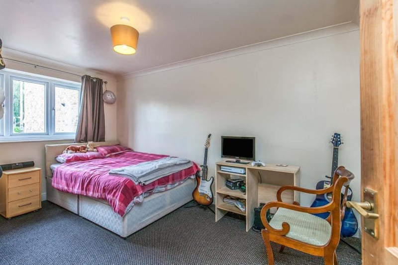 Here is another of the homely bedrooms at the Salmon Lane property. Plenty of space to indulge your hobbies!