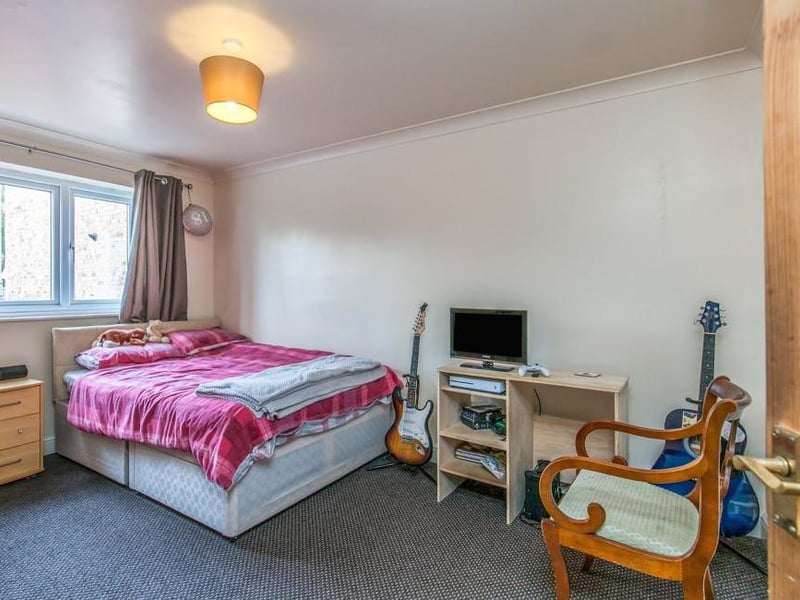 Here is another of the homely bedrooms at the Salmon Lane property. Plenty of space to indulge your hobbies!