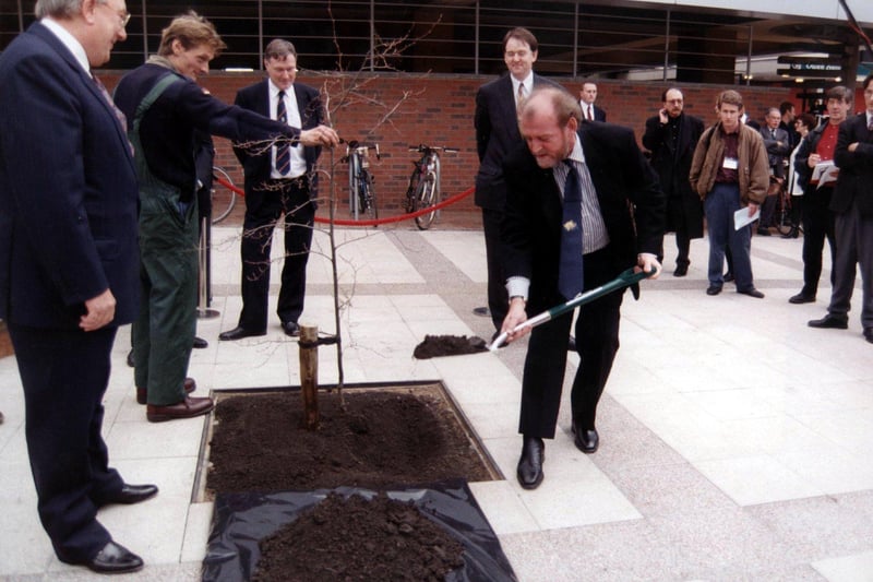 Here, Joe returned after a hugely successful solo music career to be presented with an honorary doctorate from Hallam University in April 1999. He is seen here planting a tree to mark the event