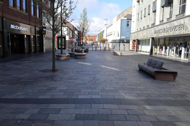 Silence on High Street West as shoppers stay at home.