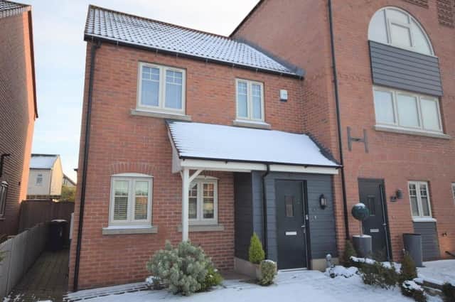 Two bedroom end town house situated in a courtyard development.