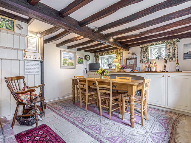 This three bedroom Grade II listed thatched cottage in Nether Wallop is on the market for £900,000. It is listed by Fine and Country.