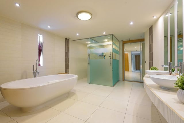 The en-suite also has a lovely walk-in shower. It is a beautiful bathroom, unrivalled by any of the other en-suites on the remaining rooms.
