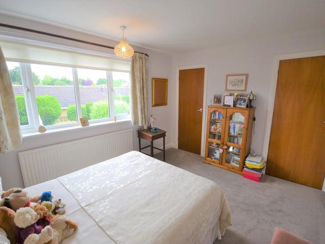 Bedroom 3 - This is another generous sized double bedroom having an attractive view of the rear garden from a UPVC double glazed window, there are various power sockets, central heating radiator and a useful storage cupboard with hanging rail.