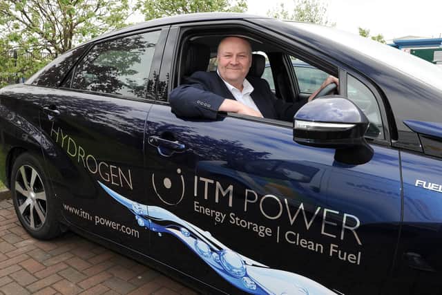 Graham Cooley, Chief Executive Officer at ITM Power in a hydrogen fuelled car.