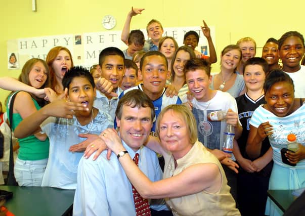 Headteacher Cath Auton and her husband Rod, the deputy headteacher, are given a surprise presentation to mark their retirement from King Edward VII Lower School in Sheffield