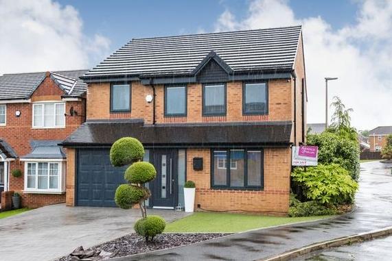 This four-bedroom, detached home, with a newly-fitted kitchen, is for sale for £320,000 with Tracy Phillips Estates.