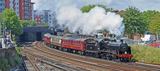Steam special. 31806 `U` class Maunsell loco hauls the Father`s Day excursion to Brockenhurst and return, seen approaching Fratton Station on Sunday 20th June. This lovely shot taken by Graham Stevens