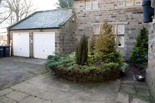 To the back of the house there is a courtyard with an adjoining double garage. The property sits in about 3/4 of an acre of gardens and grounds.
