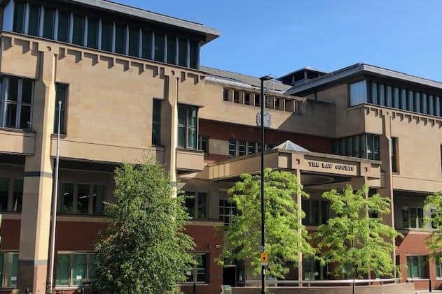 Sheffield Crown Court, pictured, has heard how a bad-tempered thug struck a neighbour so hard over the head that his victim was left bleeding significantly.