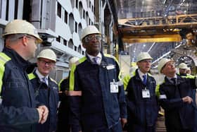 Business secretary Kwasi Kwarteng, centre, with Rolls-Royce executives on a visit to Forgemasters hosted by chief executive David Bond, right.
