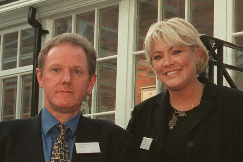 Mike Blundell  and Linda Crapper (the area  new homes manager) . Celebrating Blundells Estate agents launching of a new homes dept in 1999
