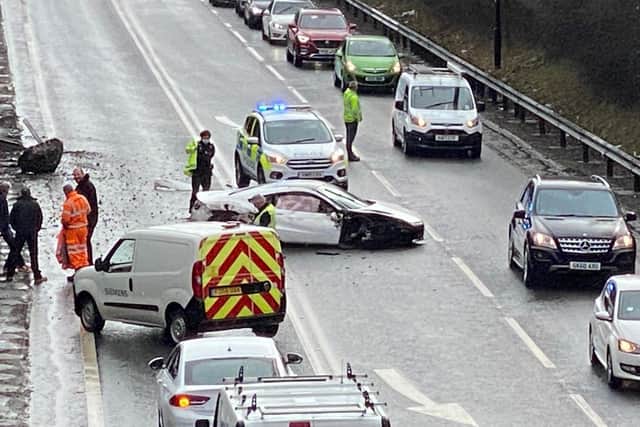 A man was taken to hospital after a car landed on its roof in a collision on the Mosborough Bypass in Sheffield