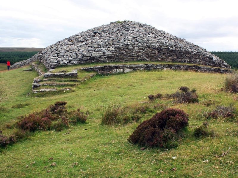 The cairns are instantly identifiable near the road and impressively complete. The ‘horned cairn’ is the best in the UK. In 2,500 bc these stone-piled structures were used for the disposal of the dead. You can crawl inside them if you’re agile (or at night, brave).