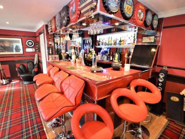 From the inside however, it’s a completely different story. The house boasts a full wrap round extension which is used as an entertainment space with a bar, pool, and snooker areas
