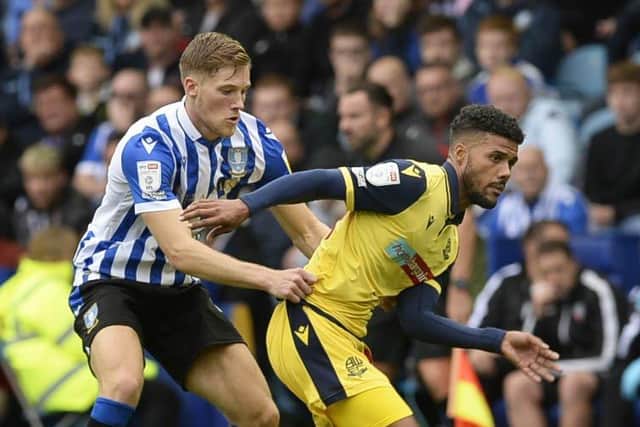 Sheffield Wednesday defender Lewis Gibson has been ruled 'for some considerable time', Darren Moore said. Pic: Steve Ellis