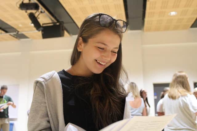 Hannah Boudaja opens her envelope at Newfield School to a 7 in English Literature and an 8 in French. She said: "I'm so happy."