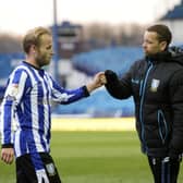 Barry Bannan is congratulated by stand-in boss Jamie Smith after a classy performance against Cardiff City.