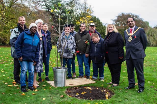 Dame Julie Kenny DBE DL, pictured in the gardens of Wentworth Woodhouse with members of ArtWorks South Yorkshire and Rotherham Mayor Cllr Tajamal Khan
 