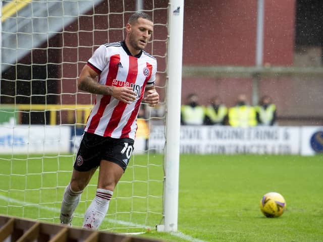 Billy Sharp after scoring for Sheffield United against Dundee United in a match that was abandoned at half time