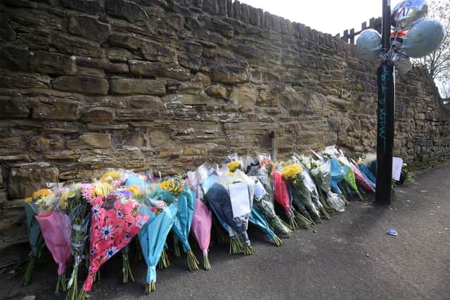 Flowers and balloons have been left at the spot where a Sheffield solicitor was gunned down in the city.
Picture: Chris Etchells