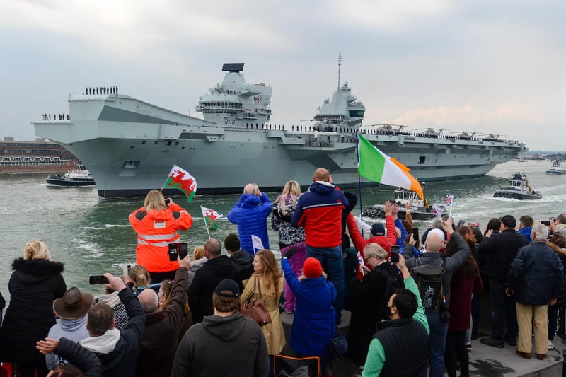 Crowds wave as HMS Queen Elizabeth leaves. Picture: Finnbarr Webster/Getty Images