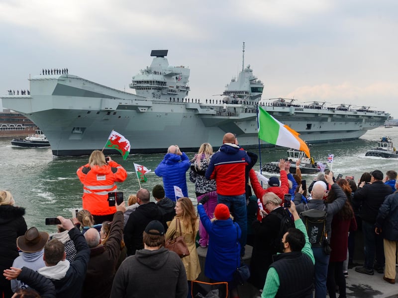 Crowds wave as HMS Queen Elizabeth leaves. Picture: Finnbarr Webster/Getty Images