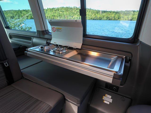 The pull-out mini kitchen in the Camper variant.