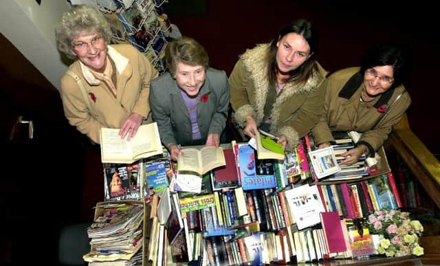 A book sale was held at Sprotborough library in 2003 to raise money for charity. Ruth Law, Shelia Smith, Carol Pashley,  Dorothy Pashley.