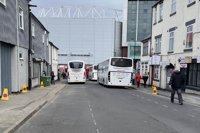 Harwood Street starts to fill up with coaches but is already blocked.