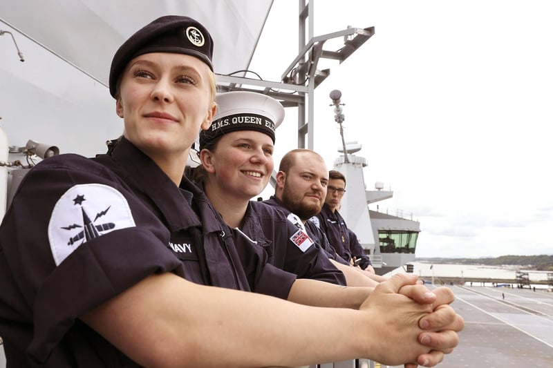 HMS Queen Elizabeth set sail on June 26, 2017, from Rosyth to begin contractor sea trials after nearly a decade under construction. Pictured are Able Seaman (AB) Natasha Elford, AB Layton Toward and AB Richard Mead. Picture: Royal Navy
