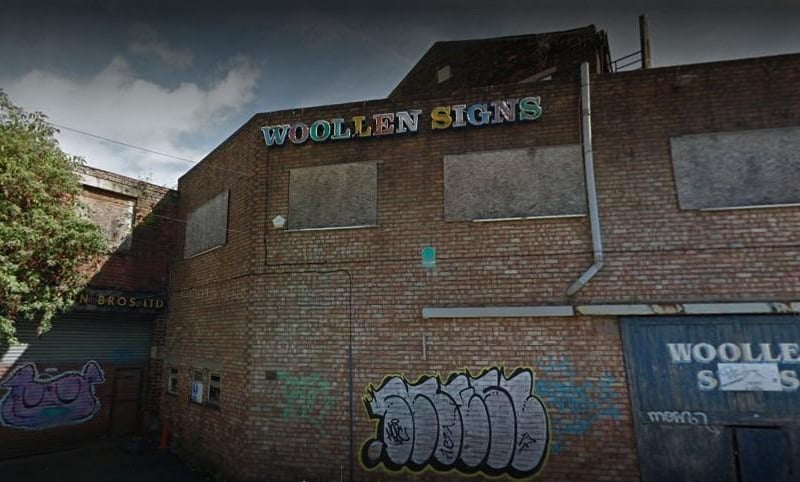 The colourful sign is still intact at Woollen & Co Ltd - appropriate considering the company itself made signs. Signs for old pubs and clubs litter the floor in the abandoned factory, where nature has now begun to take over.