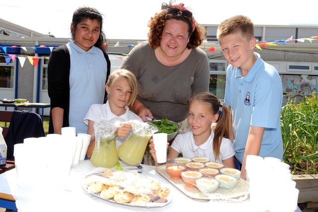 Laygate Community School pupils with horticultural artist Emma Norris, using garden produce they have grown in the schools garden. This one goes back to 2013.