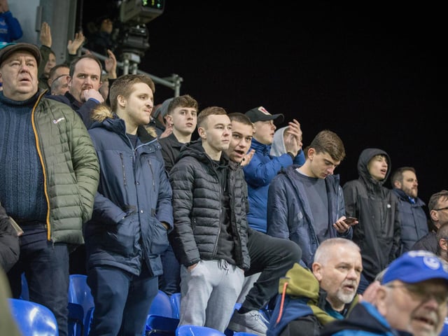 Pompey fans look disappointed after Arsenal take the lead.
