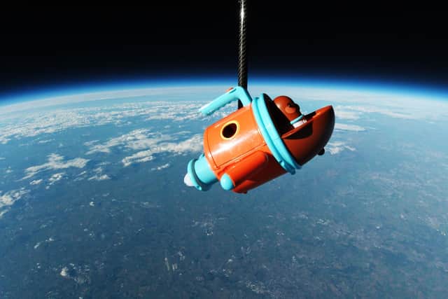 A children’s toy Hey Duggee rocket has made the journey from Sheffeld into space. It is pictured in space after its launch from a site in Attercliffe. Photo: BBC/PA Wire