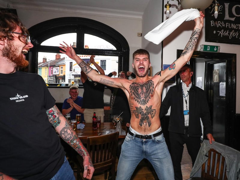 Fans pictured in The Kings pub celebrating as England score their first goal. Picture: Stuart Martin (220421-7042)