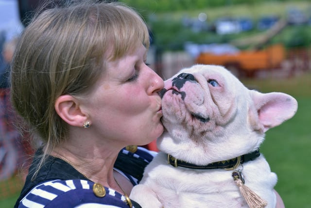 French Bull dog Barley gets a well deserved kiss from owner Caroline Craven during the Dogs Day Out in 2014. Picture by FRANK REID