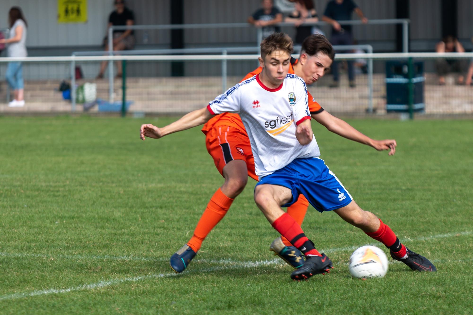 Dylan Holgate (white top) bagged a hat-trick in Gosport Borough under-18s' win at Portchester. Picture: Mike Cooter (050921)