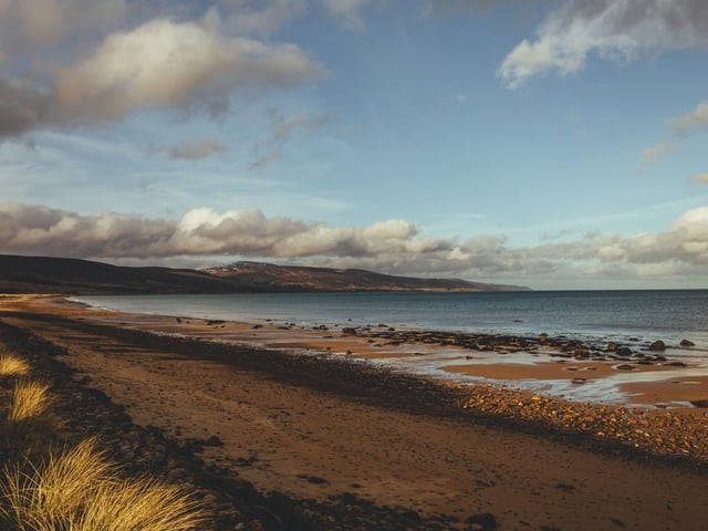 “A beautiful clean beach, sand as far as you can see. Some lovely shells and rocks to fossil hunt. Great whatever the weather.”
