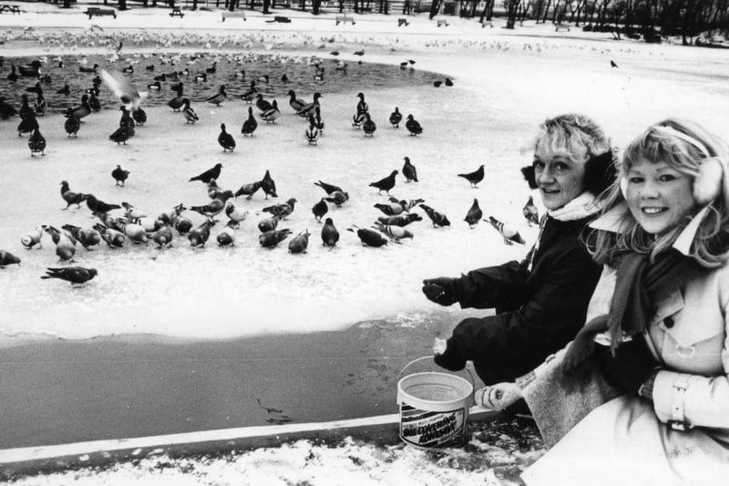 Linda Tuffield and Maria Harrison feed the birds on Marine Park lake in January 1987.