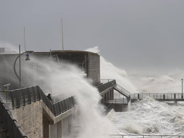 Old Portsmouth saw large waves crashing against the Hot Walls. Photos by Alex Shute