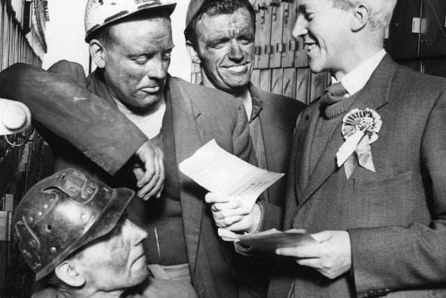 Arthur Blenkinsop. Labour candidate for South Shields, talking to miners George Falconer, Bill Bissett, Ronnie Moffatt, during a visit to Westoe Colliery in 1964.