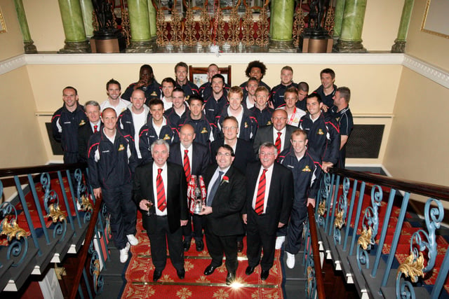 The Rovers squad and staff, owners John Ryan and Dick Watson with mayor of Doncaster Martin Winter at the Mansion House