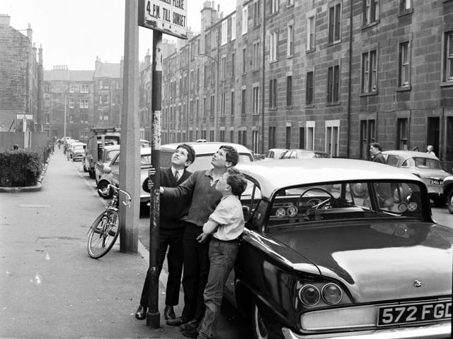 Children playing in the 'no vehicles zone' of Dalry's Caledonian Place in 1966.