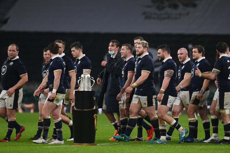 Players for Scotland walk past the Calcutta Cup after the Guinness Six Nations match between England and Scotland at Twickenham Stadium today. (Photo by Mike Hewitt/Getty Images)