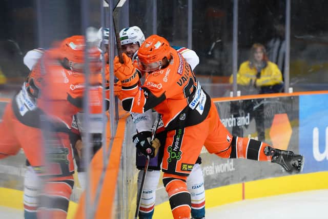 Marco Vallerand bash on the boards against Belfast. Picture: Dean Woolley