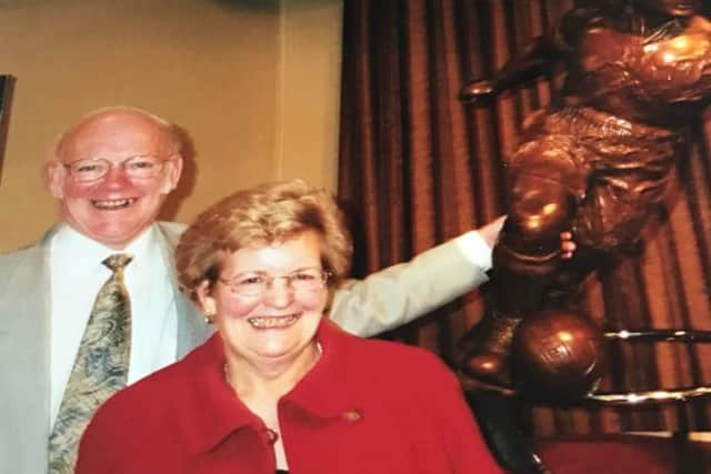 Stan and Barbara Collingwood next to a statue of Sheffield United icon Derek Dooley. Stan died on December 30, with Barbara, his wife of 42 years, dying the following day.